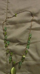 lot 300 image: green stone necklace on silver chain