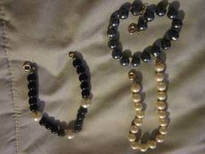 lot 583 image: white and blue pearl necklaces