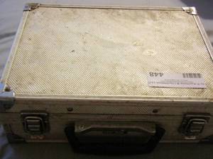 lot 448 image: small brief jewelry case full of misc. jewelry stuff