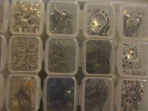 lot 451 image: jewelry box of necklace pendants, earring and necklace making stuff