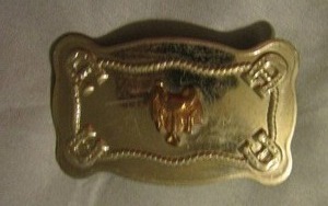 lot 485 image: Nickel silver saddle and horseshoe belt buckle small