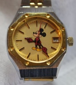 lot 27 image: Jewelry Disney Mickey Mouse two-tone polished metal watch. Bradley Time Division Model O35S