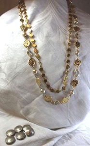 lot 28 image: Jewelry Replica coin jewelry. Includes (2) 32L necklaces and Buffalo nickel button covers.