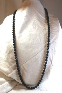lot 30 image: Sterling silver jewelry Sterling Silver faceted black glass bead necklace with sterling clasp. Marked Sterling on clasp side. 42L.