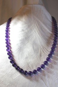 lot 32 image: 14K Gold jewelry Polished Amethyst bead necklace with 14K yellow gold clasp. Marked 14K. 24L