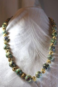 lot 35 image: Silver jewelry Vintage MCM Cloisonn necklace with sculptural spaced beads. Hand knotted. Marked Silver. On push button clasp. 22L