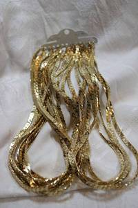 lot 56 image: (12) Gold-plated nugget style chains.16L