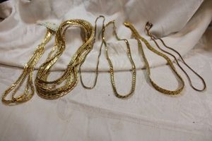 lot 57 image: (12) Gold-plated nugget and other style chains.16L