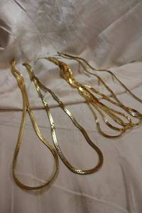 lot 58 image: (6) Gold-plated style chains