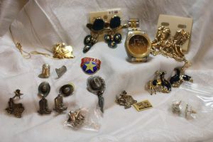 lot 67 image: Texas and Western theme jewelry. Includes an LBJ pin