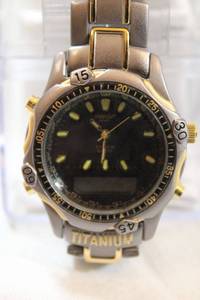 lot 97 image: Mondu Titanium quartz watch in packaging with instructions Model MG30, MG38 series Ana-digit module with alarm series