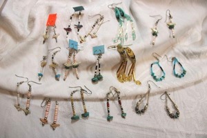 lot 105 image: Matched fetish style earrings. Approx 15 sets.