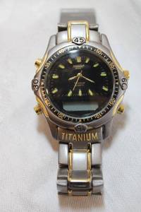 lot 110 image: Mondu Titanium quartz watch Model MG30, MG38 series Ana-digit module with alarm series. Latch needs adjustment