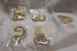 lot 116 image: (5) Gold-plated tinsel chains