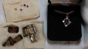 lot 136 image: Boxed Garnet pendant necklace, loose Citrines and other gemstones