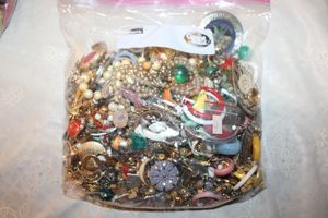 lot 152 image: Large bag of single earrings and misc. May be some matches.