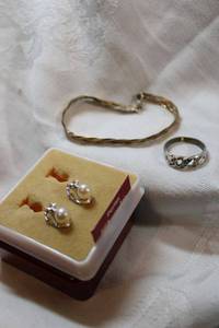 lot 164 image: Sterling Silver bracelet and boxed earrings, Includes 800 silver ring (one stone missing)