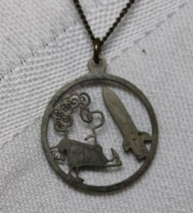 lot 166 image: RARE 1960s-era, Mad Magazine style Kick USSR cartoon space and rocket pendant necklace