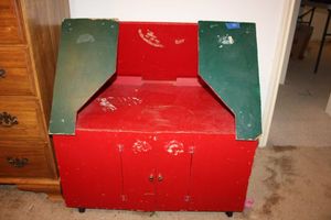 lot 311 image: Rolling red and green cabinetpet house