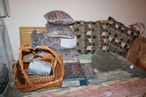 lot 342 image: Baskets and bed linens