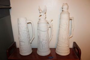 lot 418 image: Unfinished ceramics tall steins