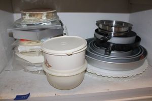 lot 455 image: Kitchen round cake pans, skillets, plastic cake stands