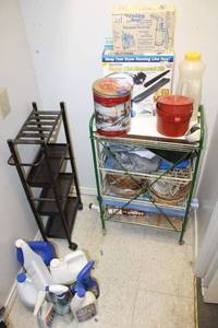 lot 463 image: Household cleaners and storage racks with contents