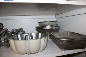 lot 483 image: Kitchen strainers, bundt pan, and more