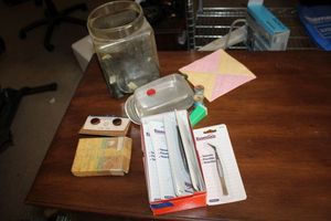 lot 593 image: Misc. items tweezers, screwdrivers, and vintage buttons