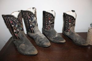 lot 597 image: Plaster filled boots
