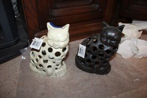 lot 612 image: Cast iron cat candle holders