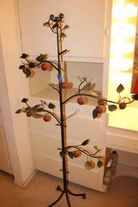 lot 532 image: Metal work candle stand with apples