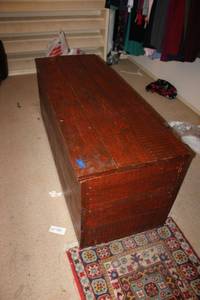 lot 557 image: Cedar Chest - tag says approx. 150Lbs