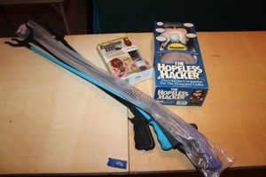 lot 498 image: The Hopeless Hacker doll, grabber tools and furniture feet