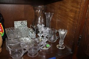 lot 633 image: Creamer and sugar sets, lead crystal vases and candle holders