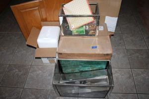 lot 257 image: Fish tanks, small cooler, and (2) boxes and cannistersfish bowls