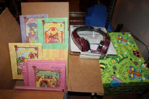 lot 592 image: Childrens books, headphones, and storage box