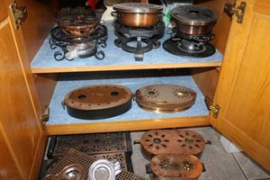 lot 243 image: Copper and brass warming burner stands