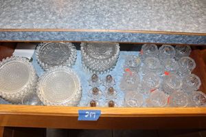 lot 247 image: Crystal salt and pepper shakers, toothpick holders, and glass saucers plus water bottles and iced tea dispenser