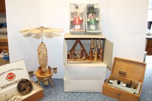 lot 262 image: Wooden carousel, wooden manger scenes, smoking dolls and vintage microscope