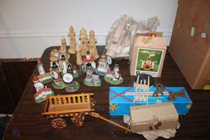 lot 271 image: Lighthouse village, wooden toy wagon, nutcracker craft kits and more