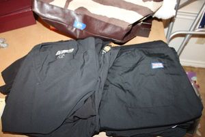 lot 299 image: Work clothesscrubs tops and pants