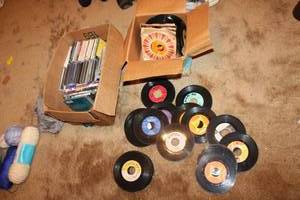 lot 304 image: 45s, DVDs, and CDs