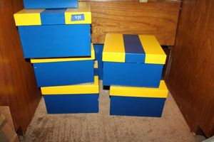 lot 439 image: Yellow and blue boxes