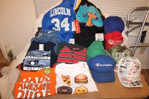 lot 306 image: Boys shirts (with tags 2T to 4T) and ballcaps