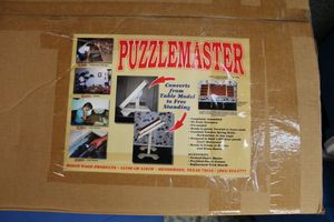 lot 652 image: Puzzle Master tilting table
