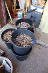 lot 838 image: Planters with rock pebbles (need to take as is)