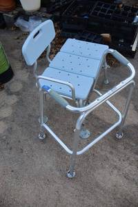 lot 856 image: Shower chair and walker