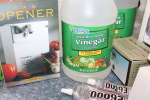 lot 465 image: Misc. lot - vinegar, can opener, glue and more