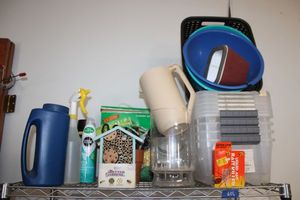 lot 656 image: Garden items Plastic totes, Bee house, wasp killer, and more